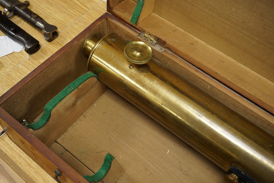 A cased brass telescope and stand, early 20th century, telescope 98cm long. Condition - fair